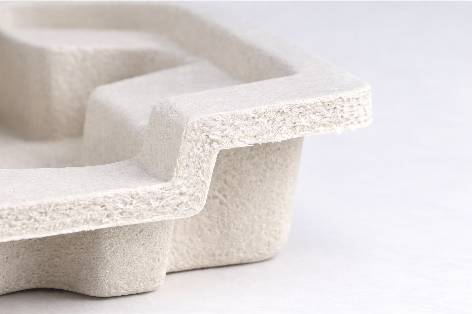 custom molded pulp thickness control cross section